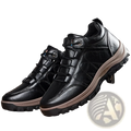Men’s leather hiking boots in black with tan midsole and rugged tread for outdoor use