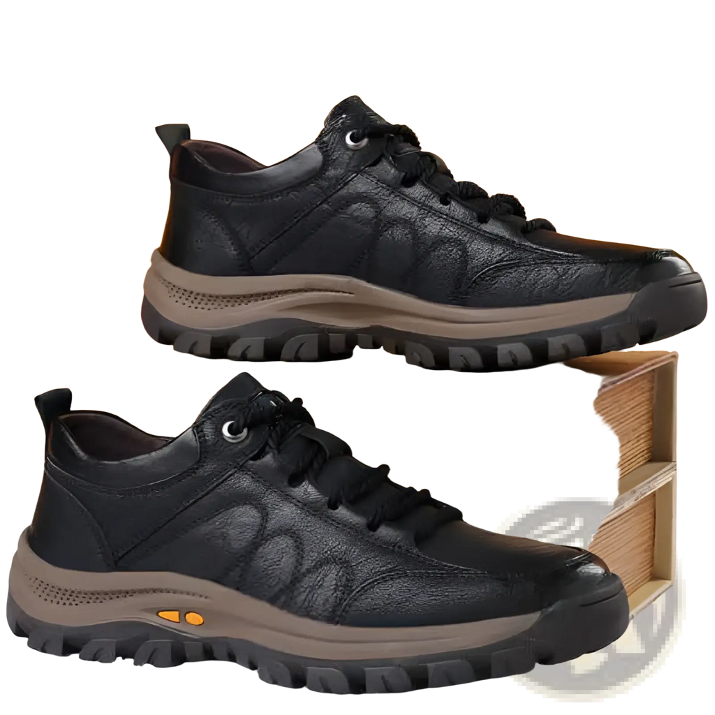 Men’s leather hiking shoes in black with textured pattern and tan midsole for vintage casual footwear use