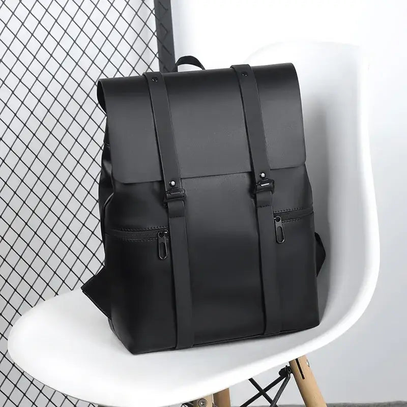 Black leather laptop backpack with flap closure soft handle air cushion and phone pocket for men