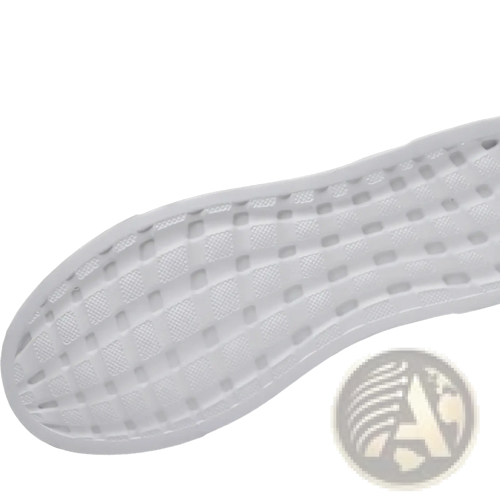 White rubber sole with grid tread pattern of men’s leather low top sport fashion sneakers shown from the back side