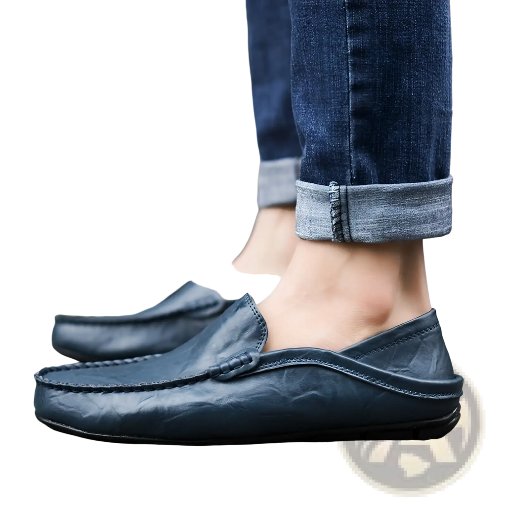 Men’s dark blue leather moccasin loafers slip on shoes with soft worn texture and visible stitching along seams