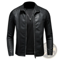 Men’s slim fit black leather motorcycle jacket with quilted shoulder panels and silver zipper accents