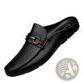 Men’s black leather mule loafers with textured woven pattern and silver horsebit buckle accented by red and green stripes