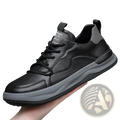 Men’s leather perforated breathable sneaker in black with gray accents and textured sole for comfortable wear