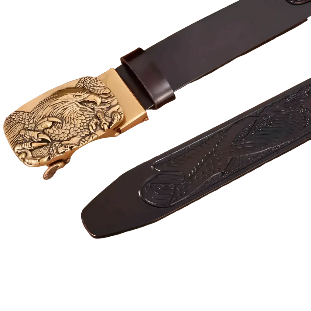 Men’s black leather ratchet belt with gold-toned eagle buckle featuring intricate feather and claw engraving