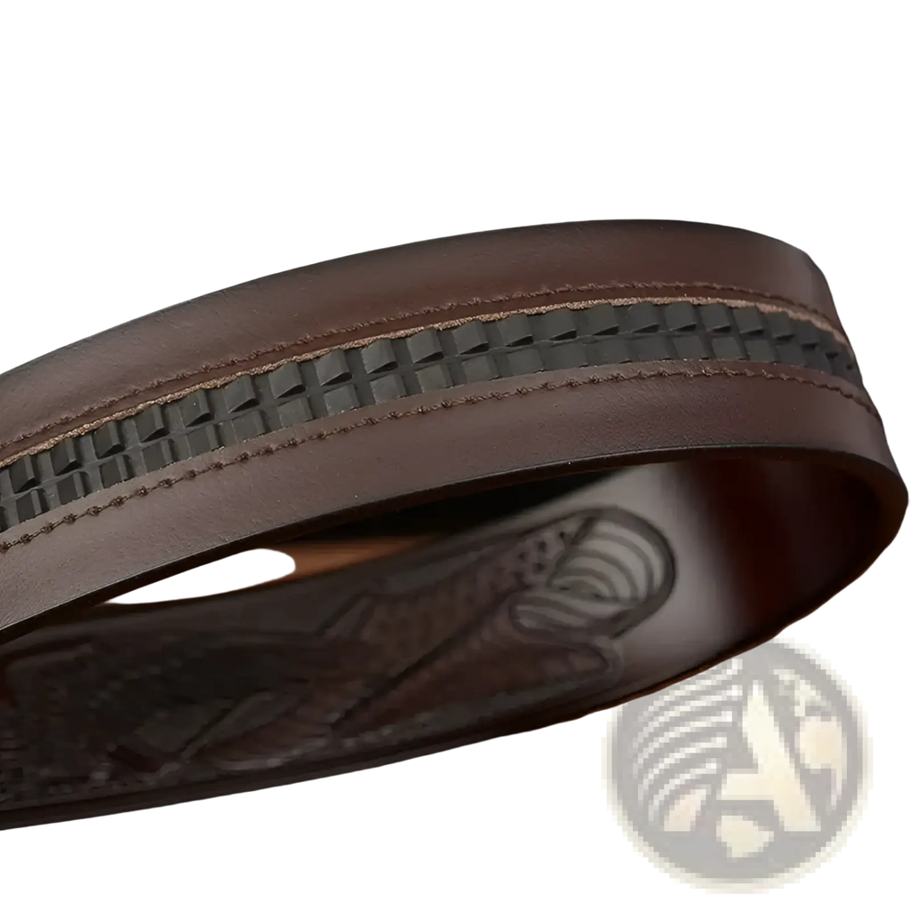 Men’s brown leather ratchet belt with eagle buckle featuring a textured woven edge and embossed inner design shown from back side