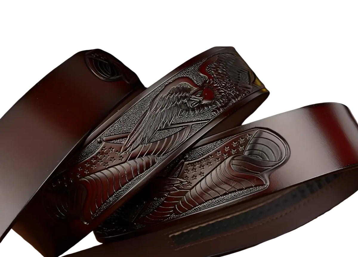 Men’s dark brown leather ratchet belt featuring an intricately engraved eagle buckle with stars and stripes design