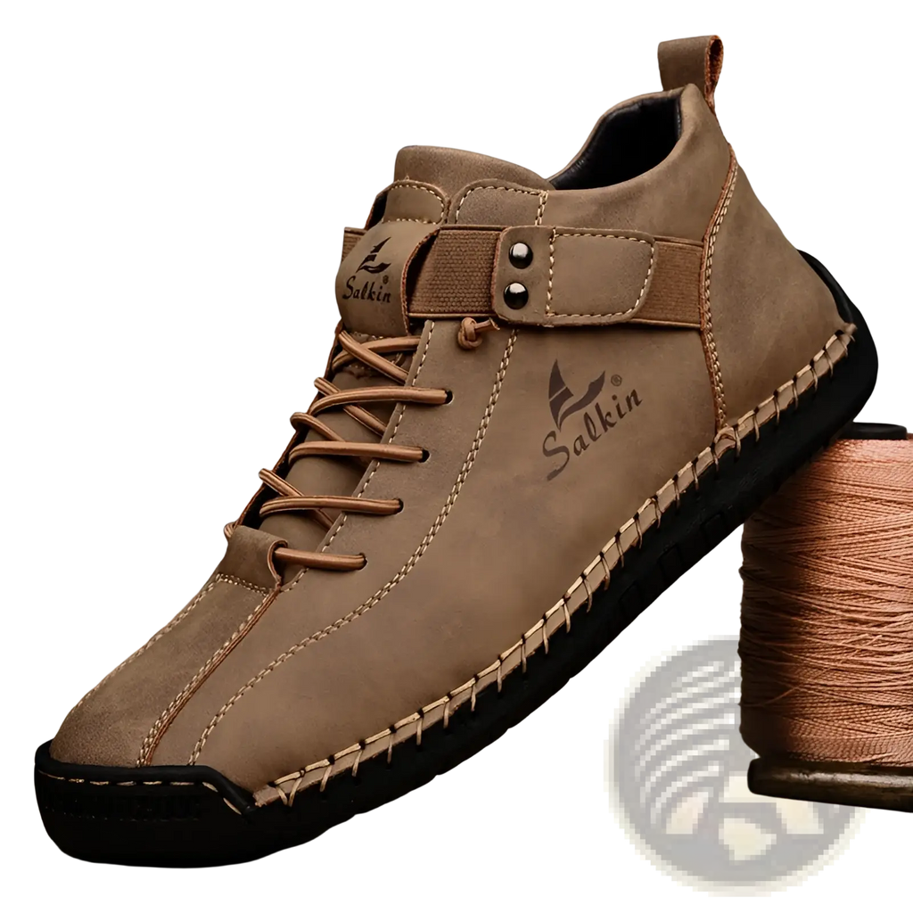 Men’s leather plus size salkin ankle boot with tan suede upper black rubber sole and matching laces visible from back side