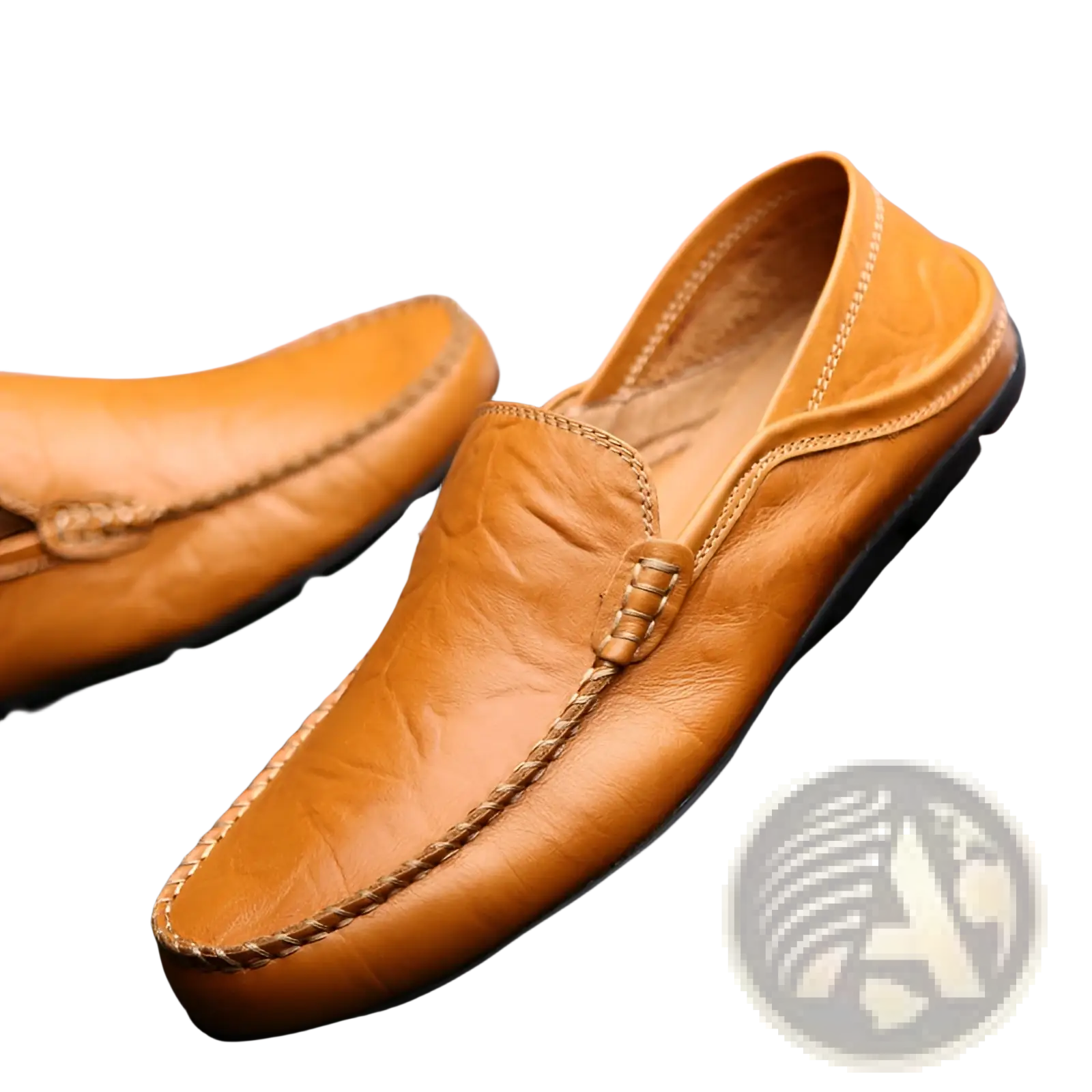 Tan leather men’s slip on loafer with braided stitching and black rubber sole for casual driving shoes