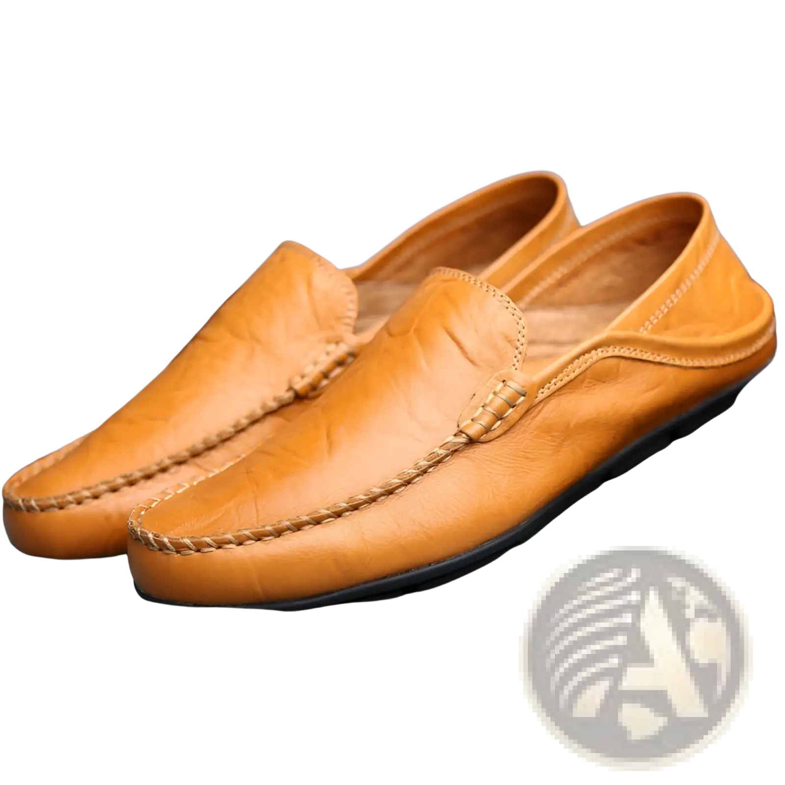 Men’s leather slip on loafers in tan with visible stitching and black rubber sole for casual driving use