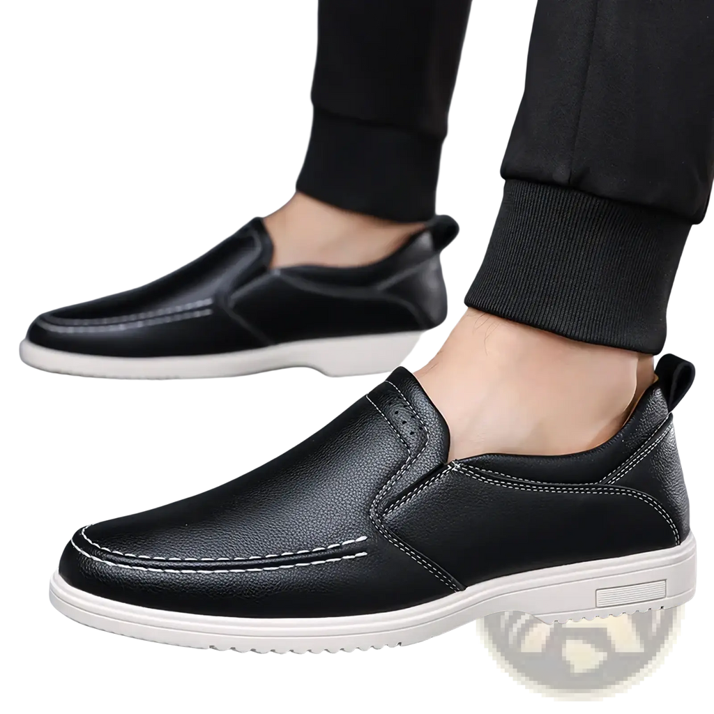 Mens leather slip on shoes casual sneakers in black with white stitching and contrasting white rubber sole