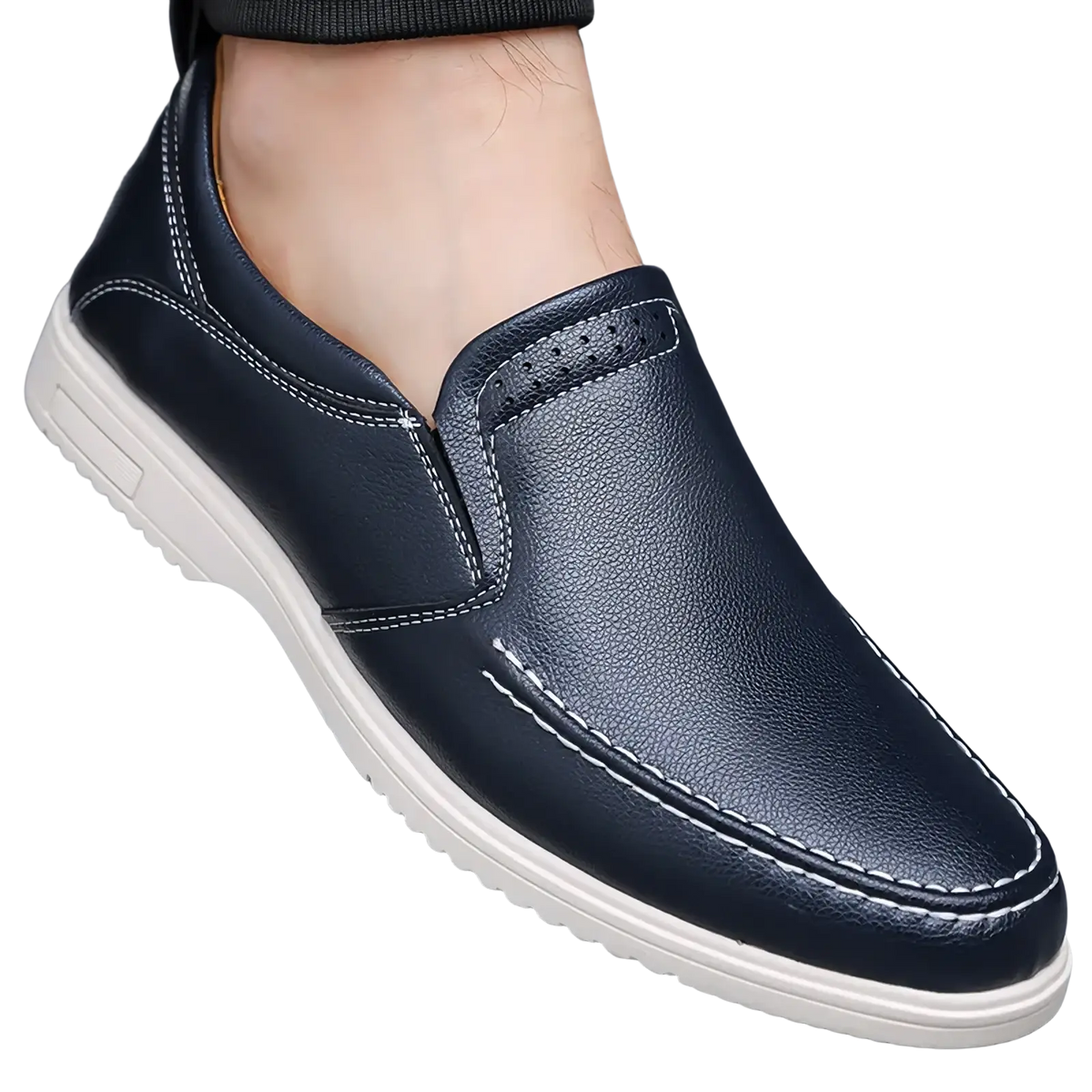 Mens leather slip on shoe in dark blue leather with white stitching and off-white rubber sole for casual wear