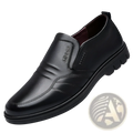 Black leather slip on men’s shoe with textured non slip sole and detailed stitching for everyday wear