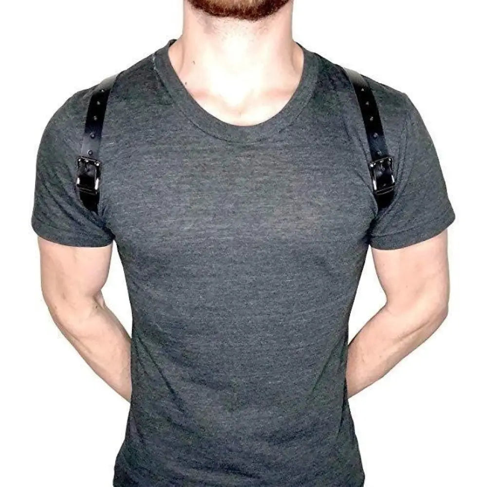 Men’s adjustable black leather shoulder strap with silver studs featuring silver-toned metal buckles