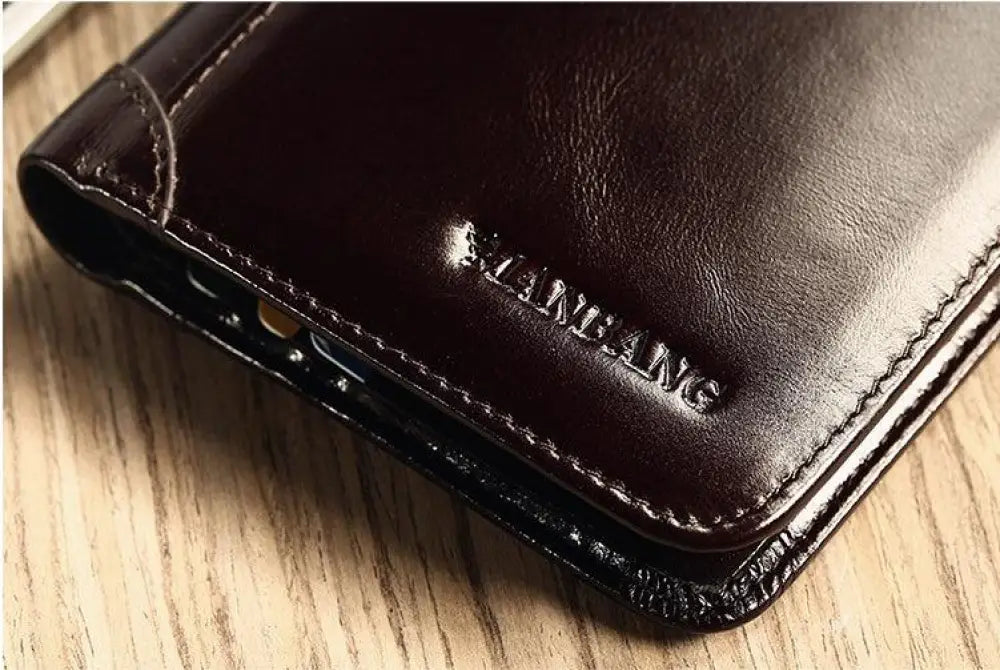 Men’s brown leather tri-fold wallet with id window dark brown leather and embossed xianfang branding with stitching