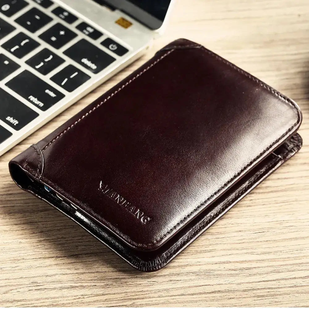 Men’s brown leather tri-fold wallet with id window featuring precise stitching and subtle embossed brand name