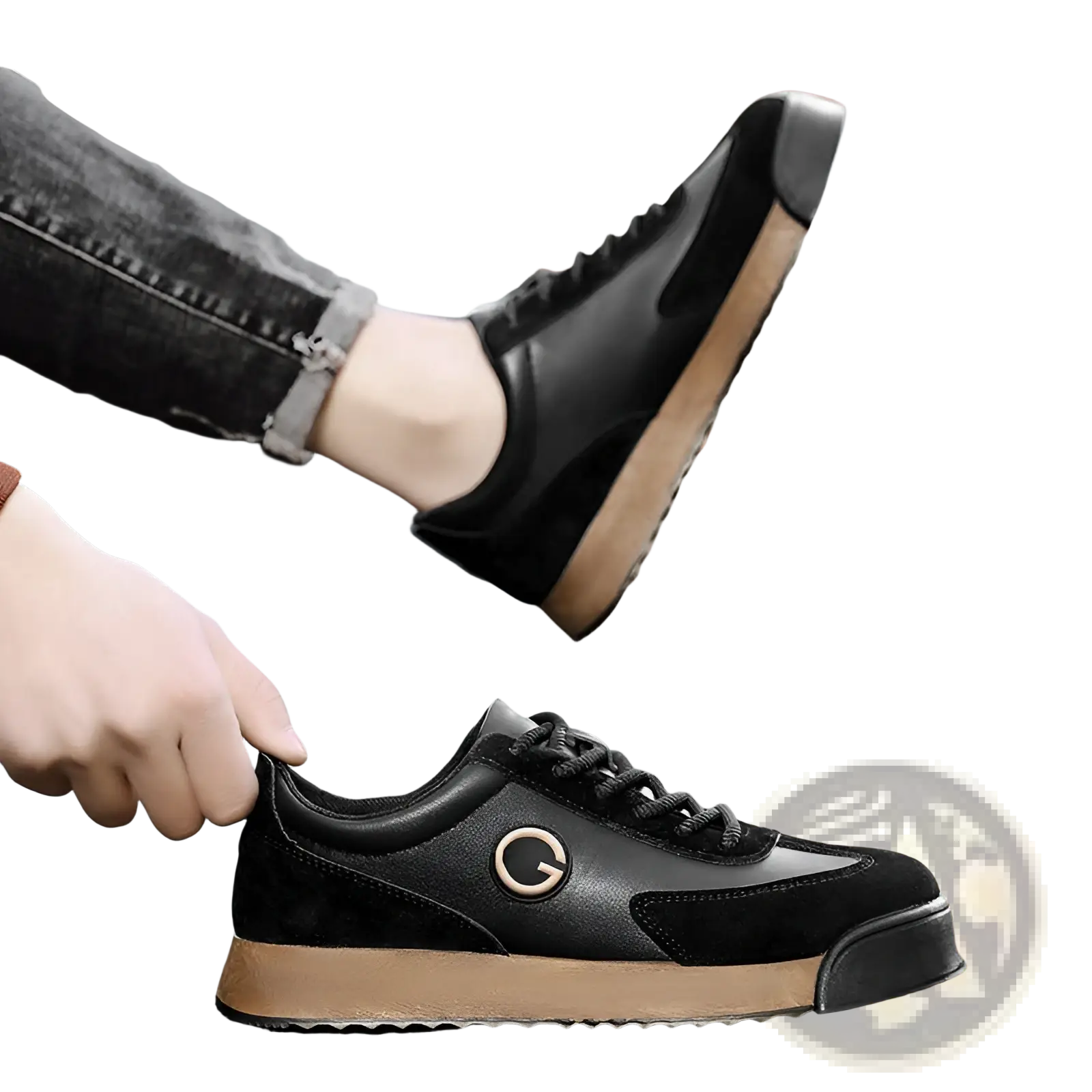 Men’s leather waterproof casual sneaker in black leather and suede with tan rubber sole and gold circular logo on side