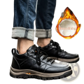 Men’s black leather winter hiking boots with fleece lining and rugged sole designed for waterproof outdoor use