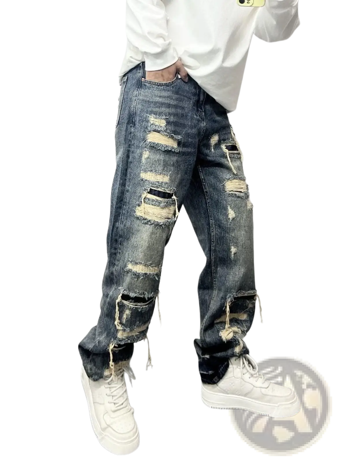 Men’s light blue distressed ripped patch denim jeans featuring multiple ripped patches and frayed edges