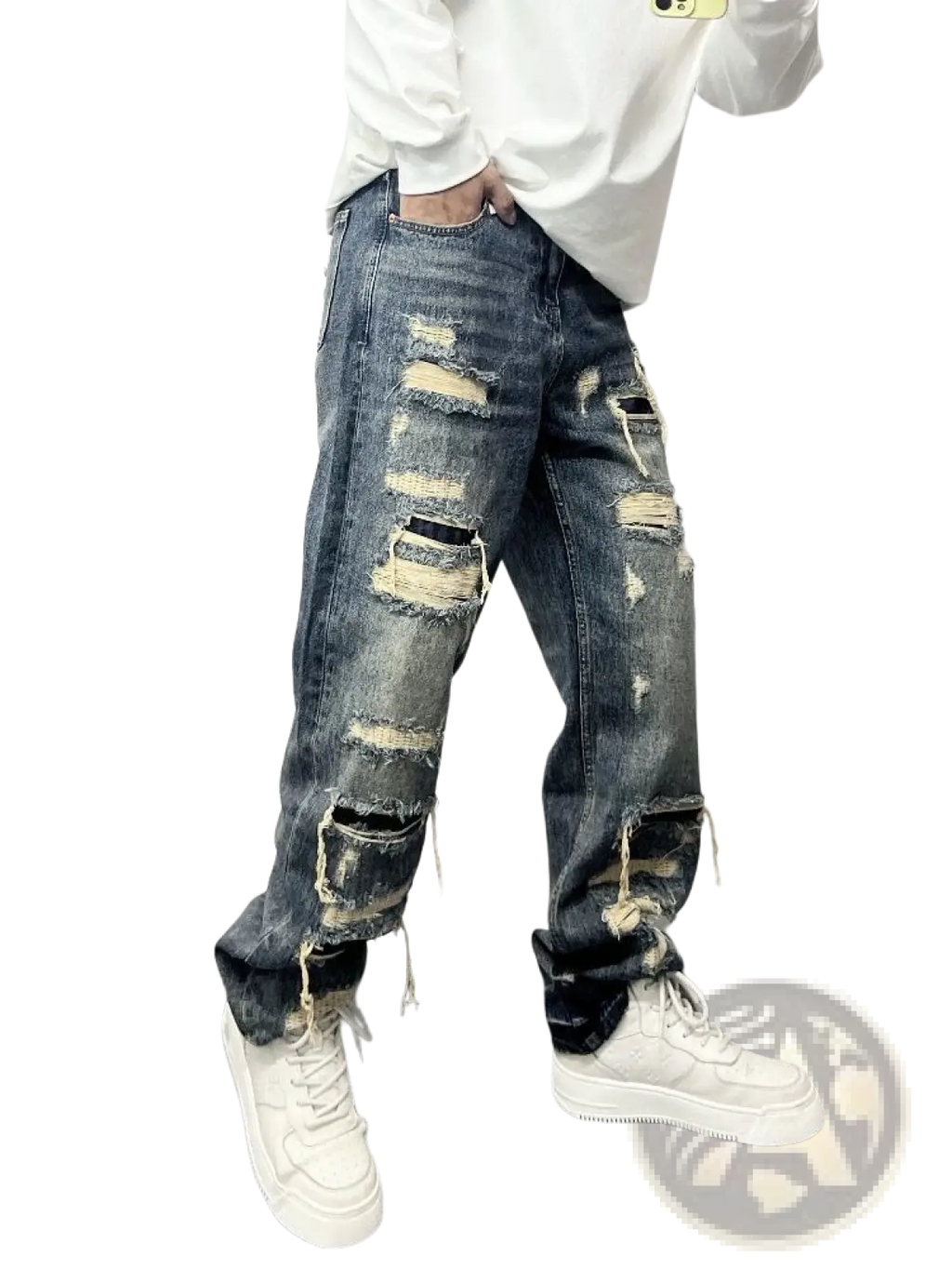 Men’s light blue distressed ripped patch denim jeans featuring multiple ripped patches and frayed edges
