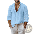 Men’s linen beach shirt in light blue with long sleeves rolled up made of lightweight breathable fabric