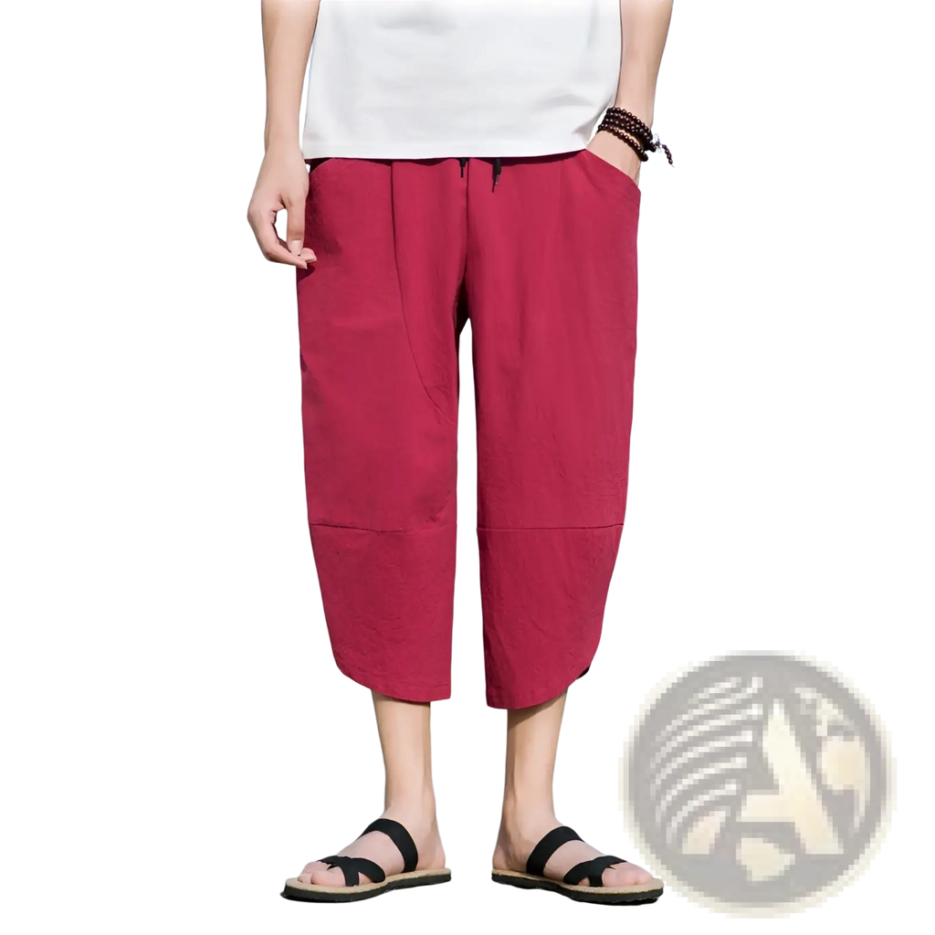 Men’s red linen casual beach pants with a loose fit drawstring waist and patch pockets