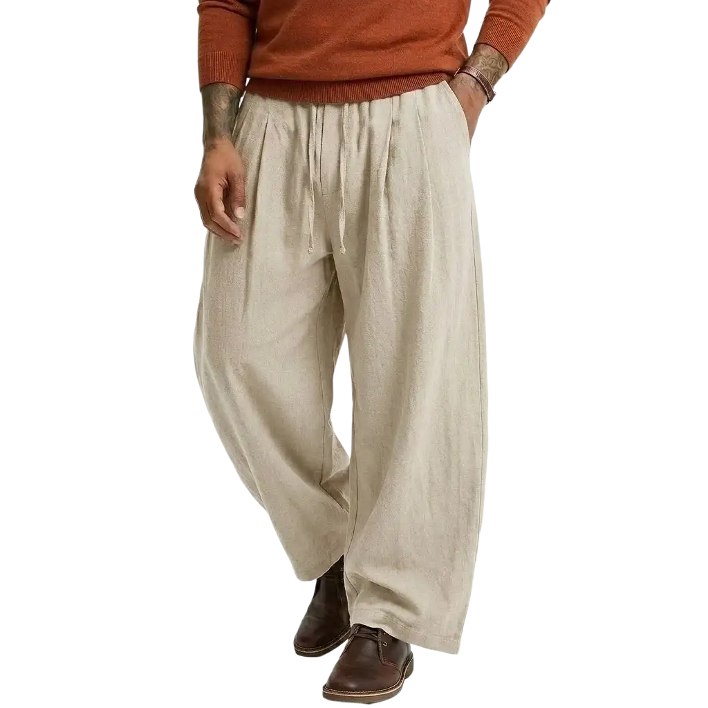 Beige linen casual pants for men with a drawstring waist and relaxed wide-leg cut in cotton fabric