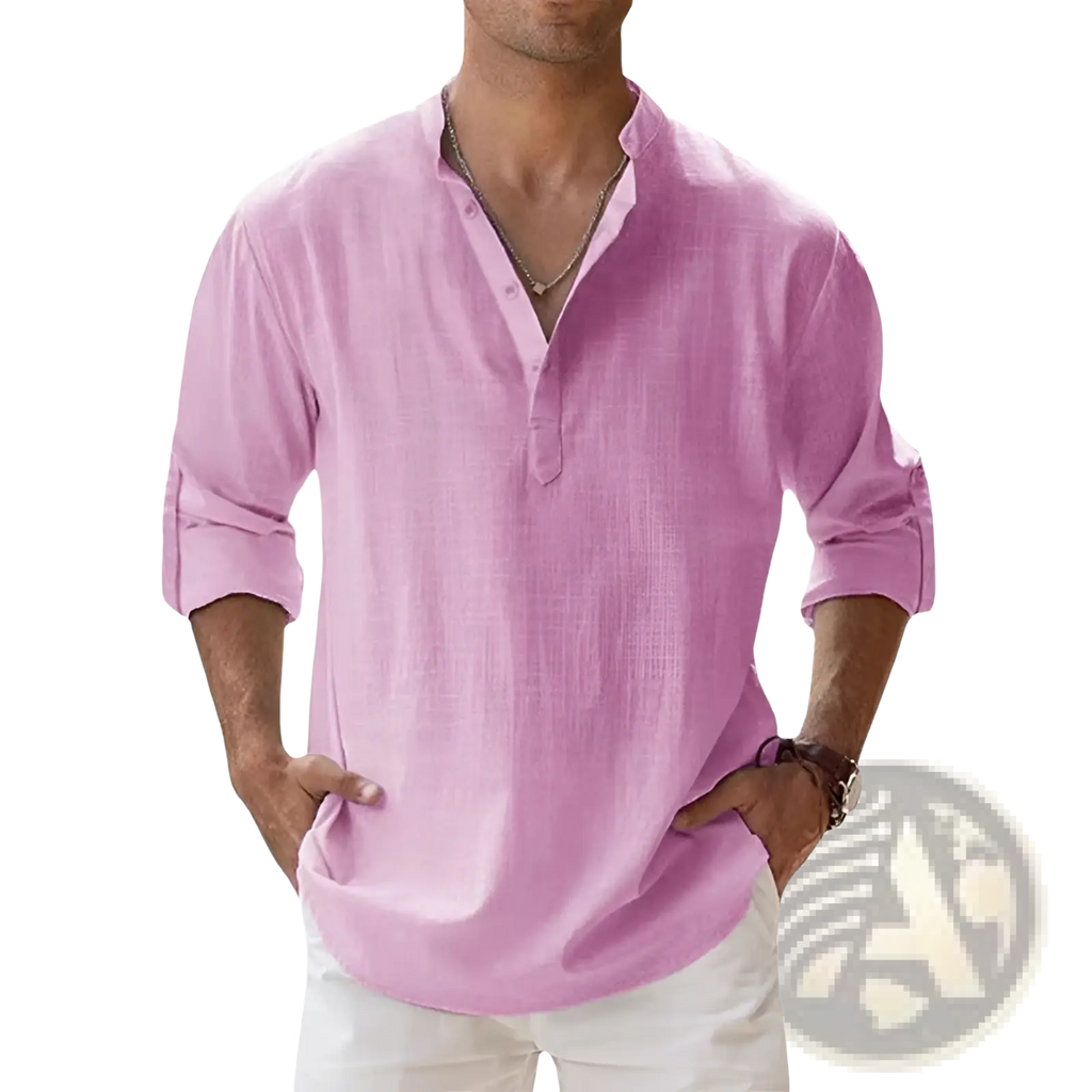 A light pink mens linen henley shirt with long sleeves, buttoned collar, and rolled cuffs for casual wear