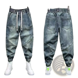 Gray denim mens loose harem pants with elastic waistband and white drawstrings for casual comfort