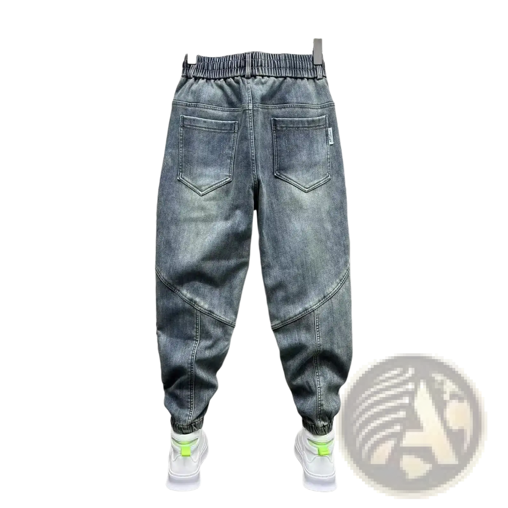 Mens loose denim harem pants in gray denim with relaxed fit elastic waistband and cuffed hems