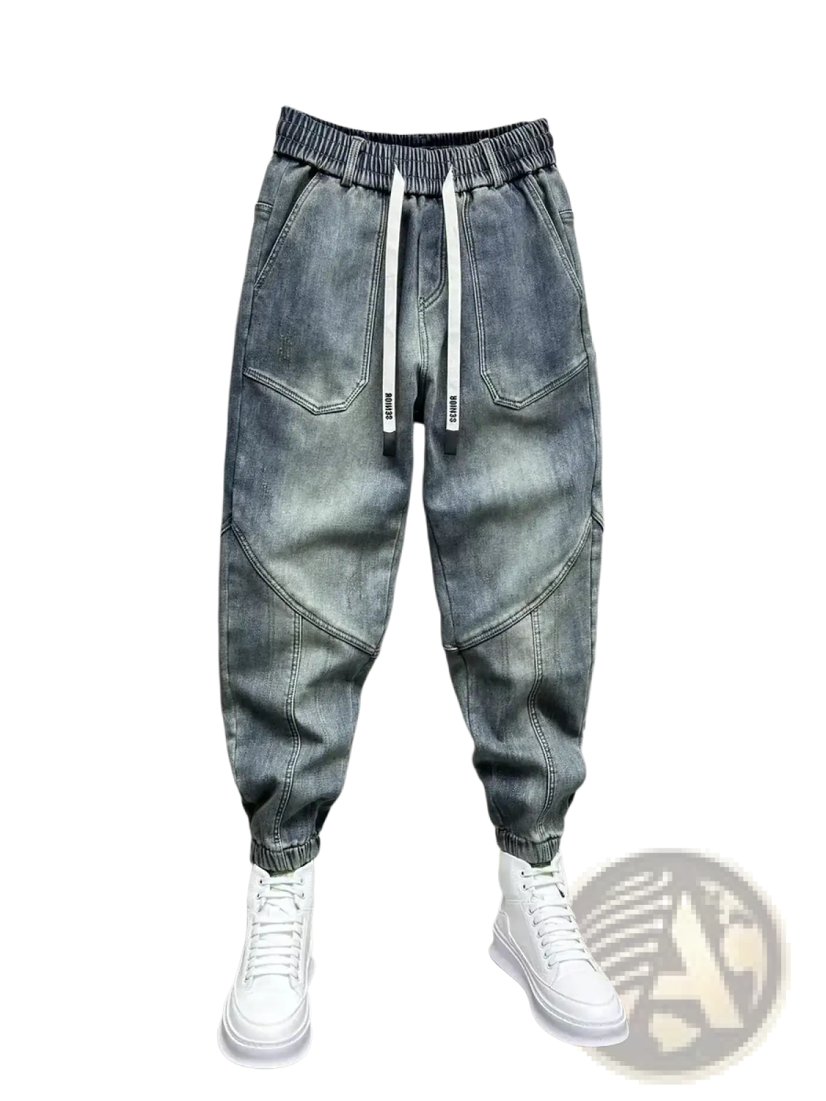 Mens loose denim harem pants in light-wash denim with a drawstring waist and white cord accents