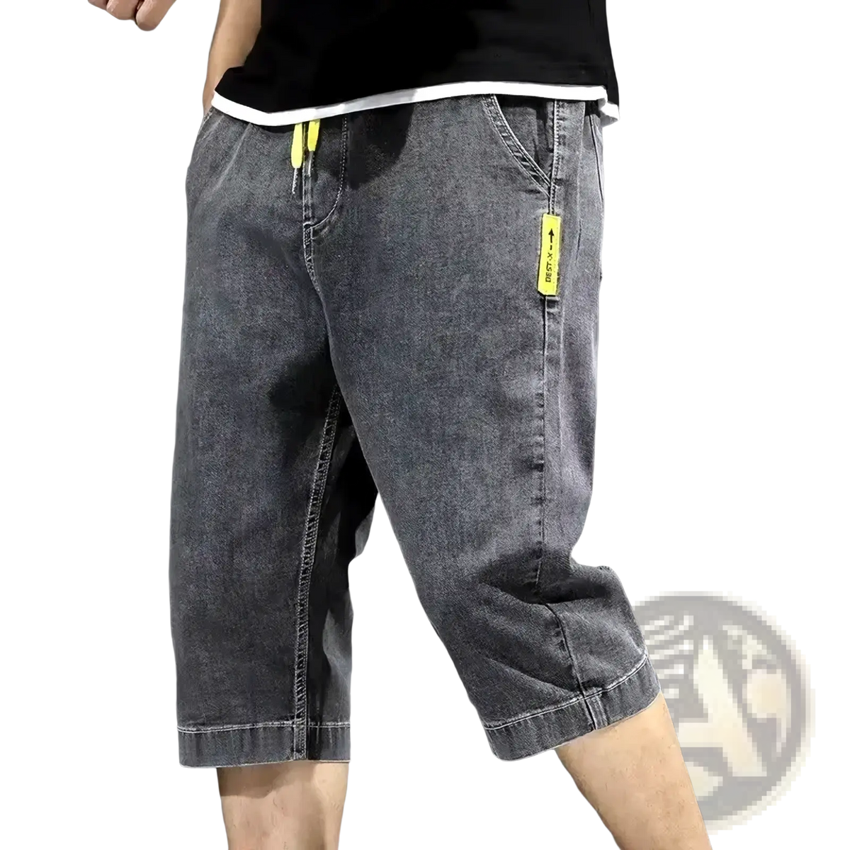 Men’s loose dark gray denim shorts with neon yellow drawstring and tag accents for summer casual workwear