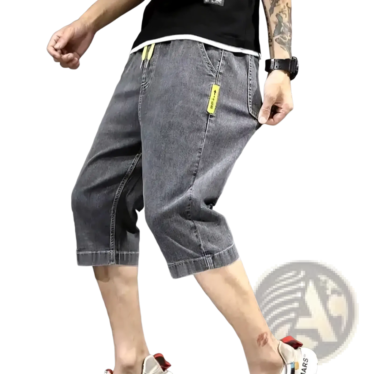 Men’s loose grey denim shorts with bright yellow drawstring and pocket tags for summer casual workwear
