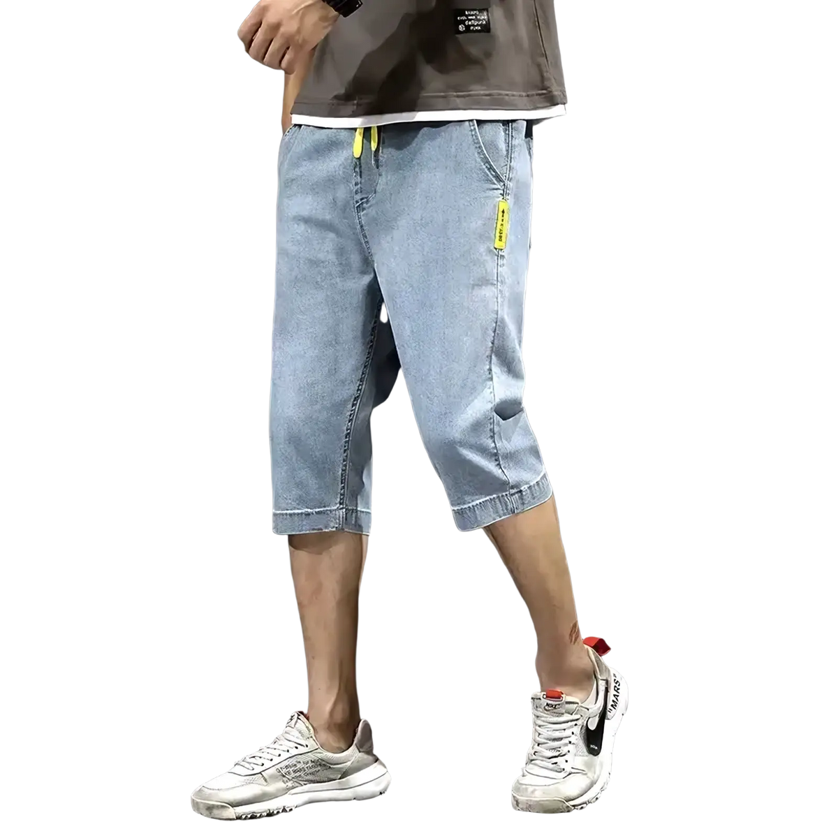 Men’s loose light-wash denim shorts with bright yellow drawstrings for summer casual workwear