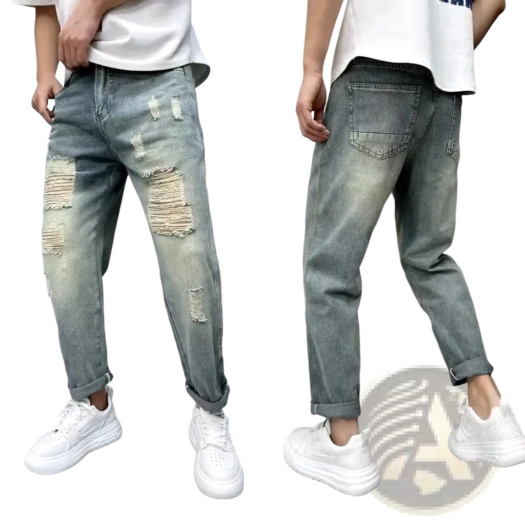 Men’s loose fit distressed straight leg light-wash denim jeans with ripped details on thighs and knees
