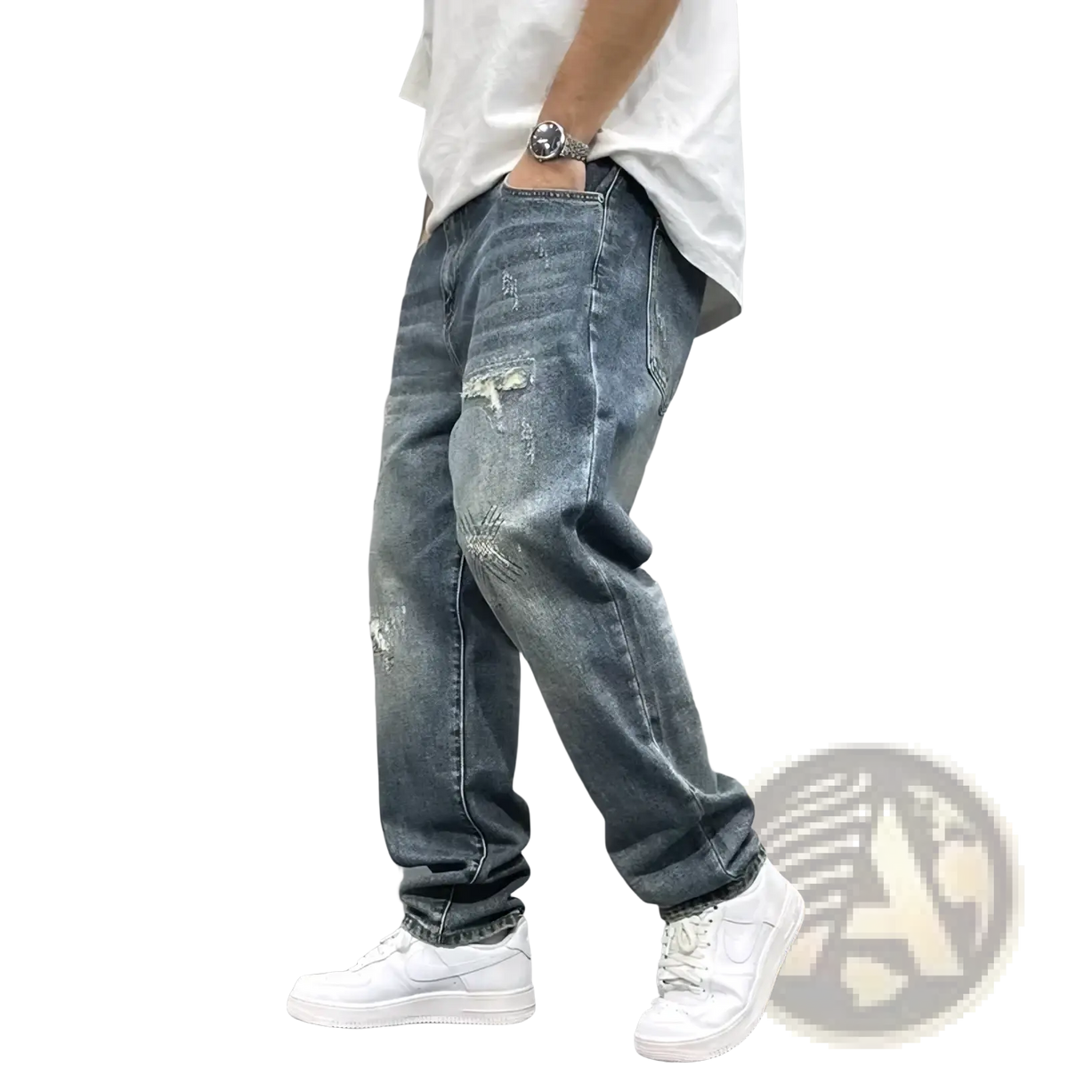 Men’s loose fit distressed straight leg denim jeans in medium wash with ripped knees and faded detailing