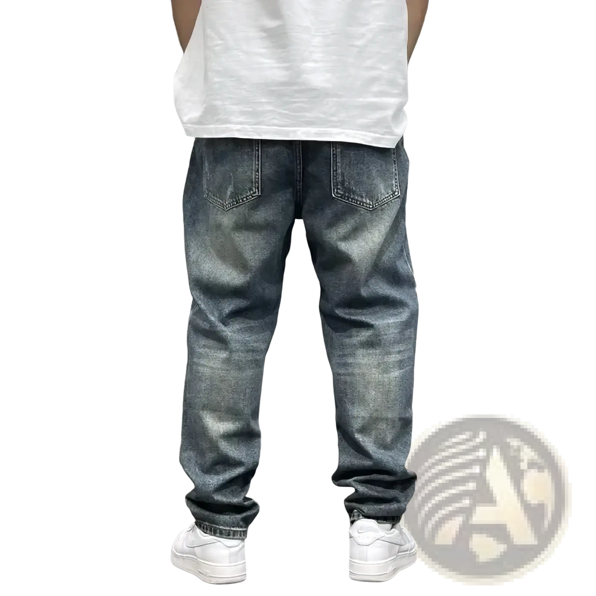 Men’s loose fit distressed straight leg denim jeans in washed blue with relaxed fit and subtle fading