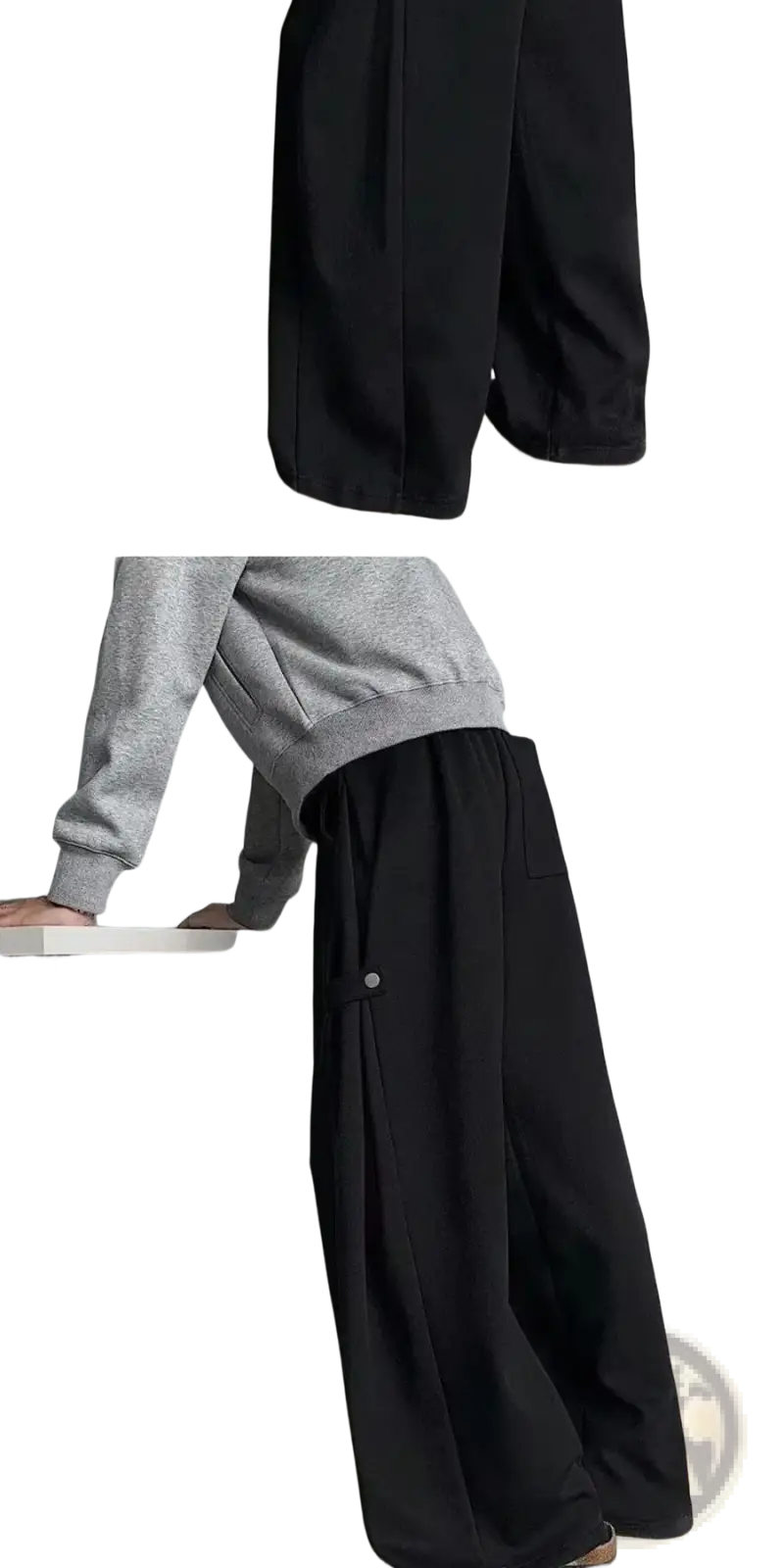 Men’s loose fit wide leg casual sweatpants in black with a relaxed flowing silhouette and subtle side pockets