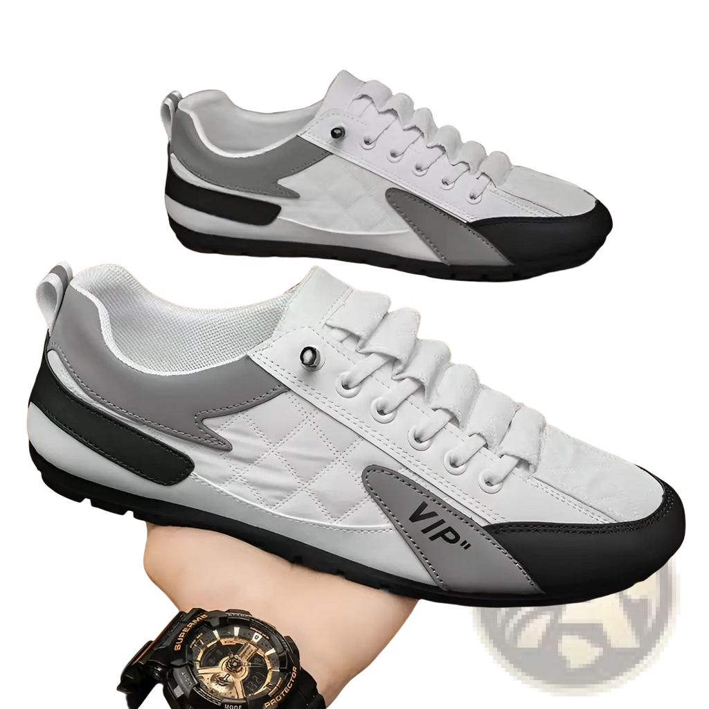 Men’s low top quilted athletic fashion sneakers in white and gray with black accents featuring vip logo on side
