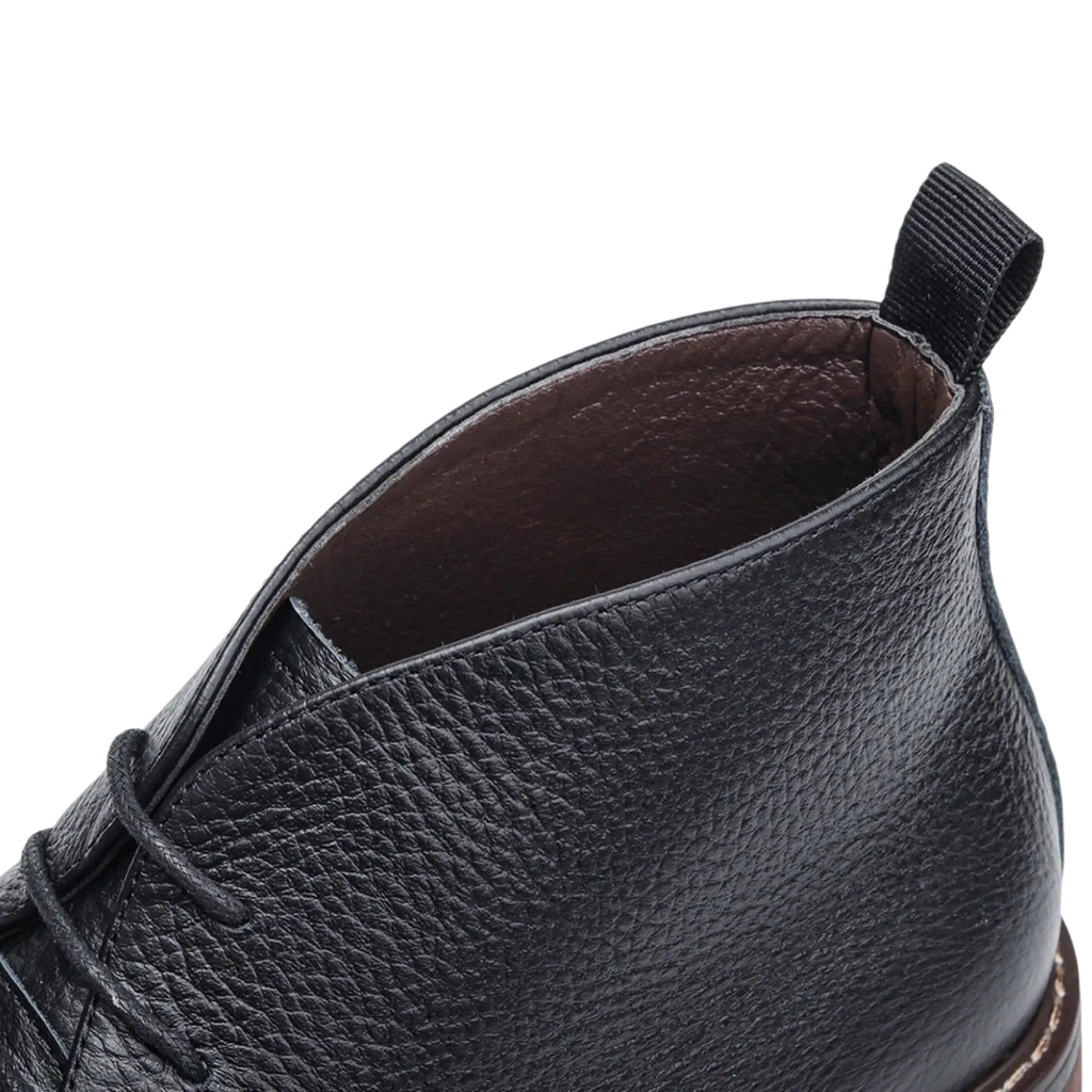 Men’s lychee pattern cowhide Chelsea Martin boots in black leather with textured surface and brown interior lining