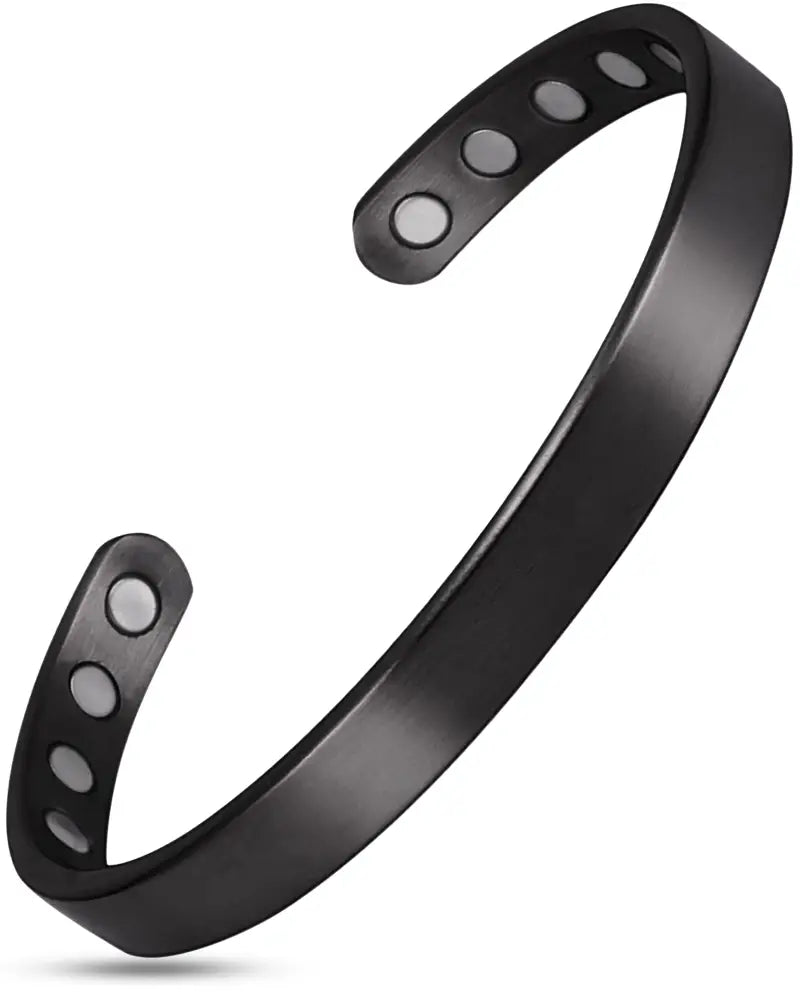 Men’s brushed black magnetic stainless steel cuff bracelet with sleek matte finish and circular cutouts along its length
