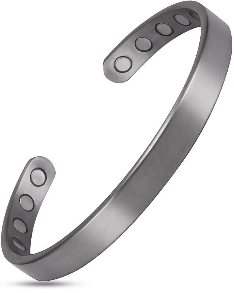 Men’s brushed silver magnetic therapy cuff bracelet with a sleek silver-toned design and five circular cutouts on each end