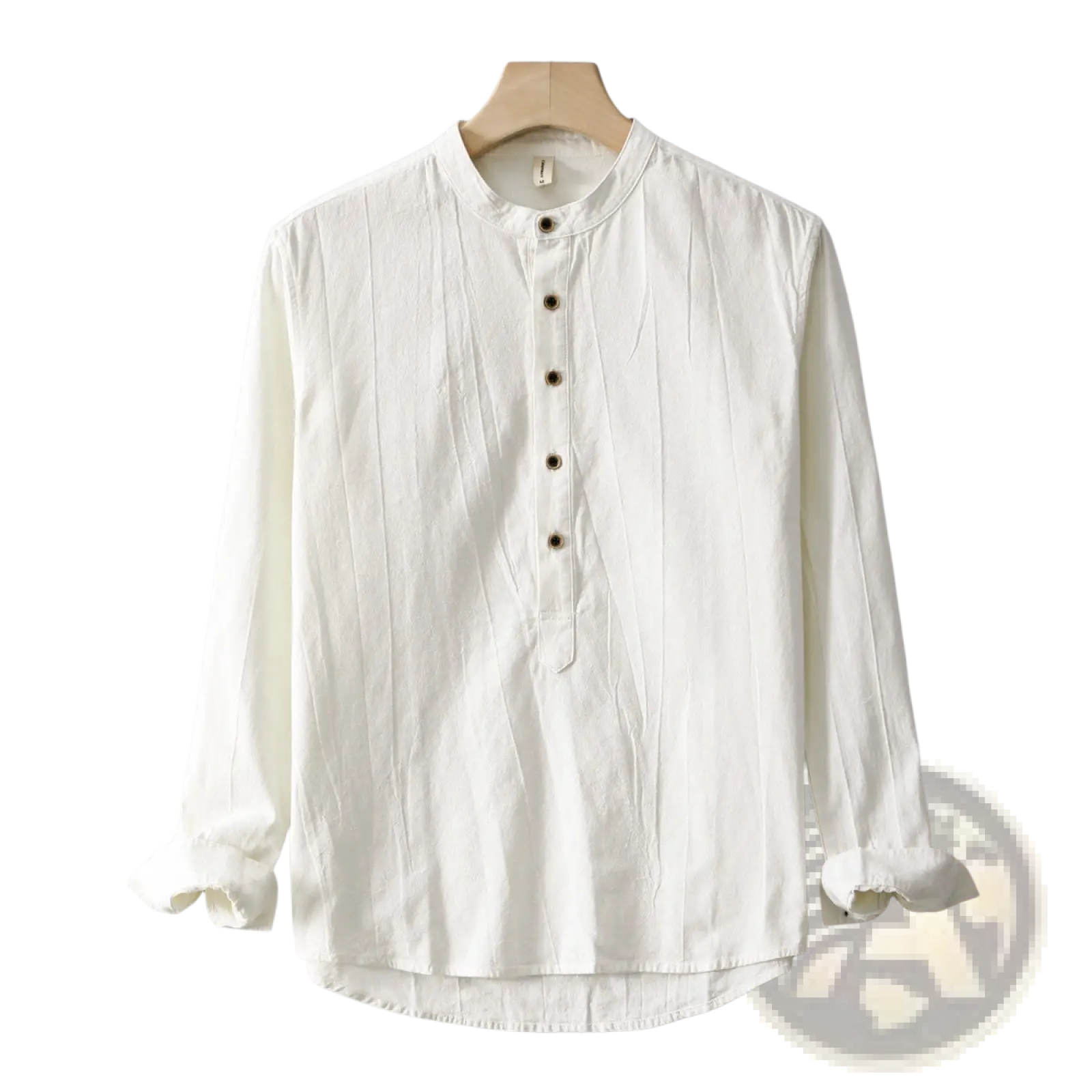 A white mens mandarin collar linen shirt with long sleeves, button-up front, and rolled cuffs