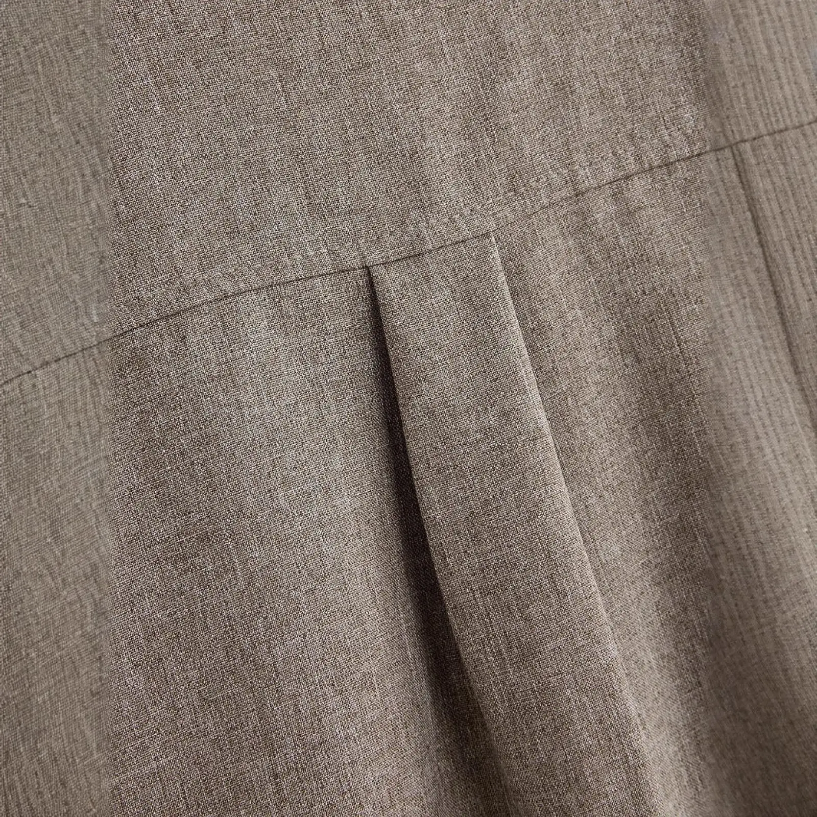 Beige linen mens mandarin collar short sleeve casual shirt with subtle textured weave and visible seam stitching