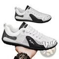 Men’s white and black mesh slip on breathable casual sneakers with bold lettering and a sleek modern design