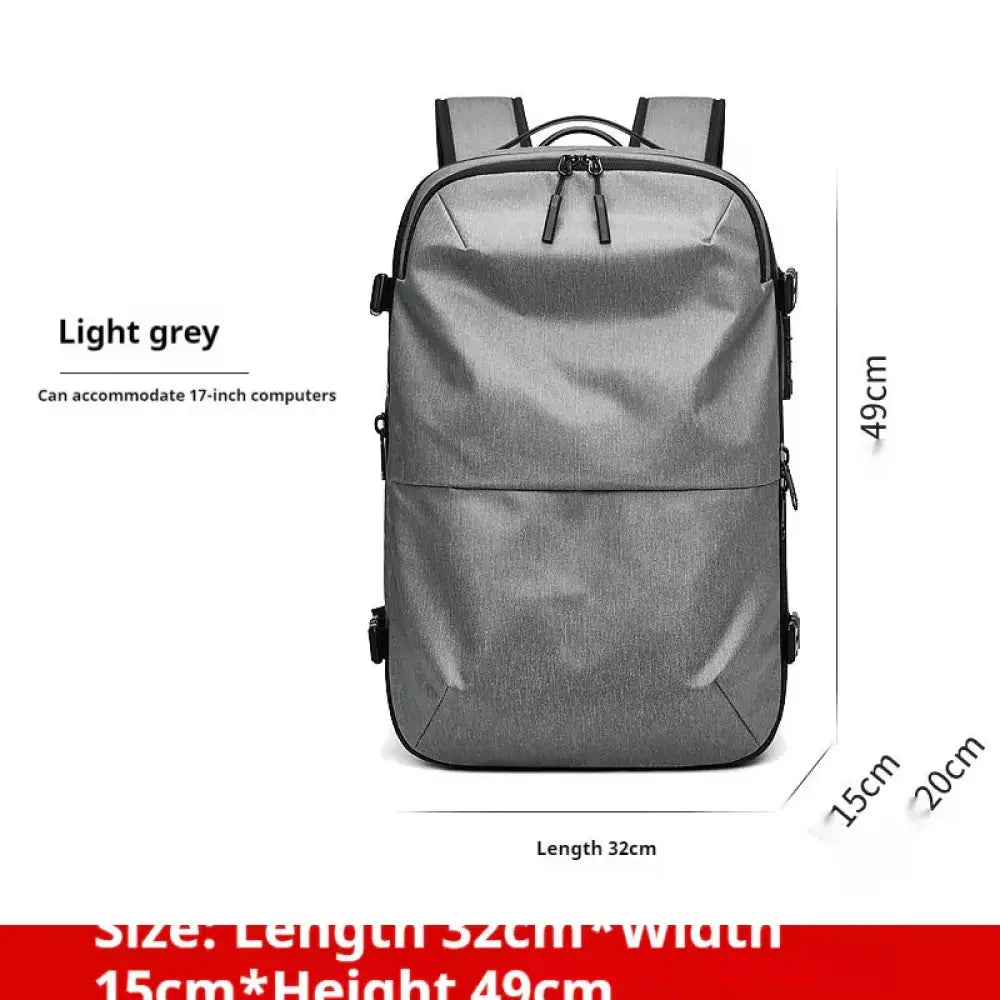 Men’s vacuum compression 60l expandable travel backpack in light grey with black trim fits 17-inch laptops