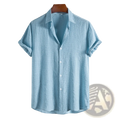 Men’s minimalist light blue short sleeve grid shirt with textured slightly wrinkled fabric and rolled cuffs