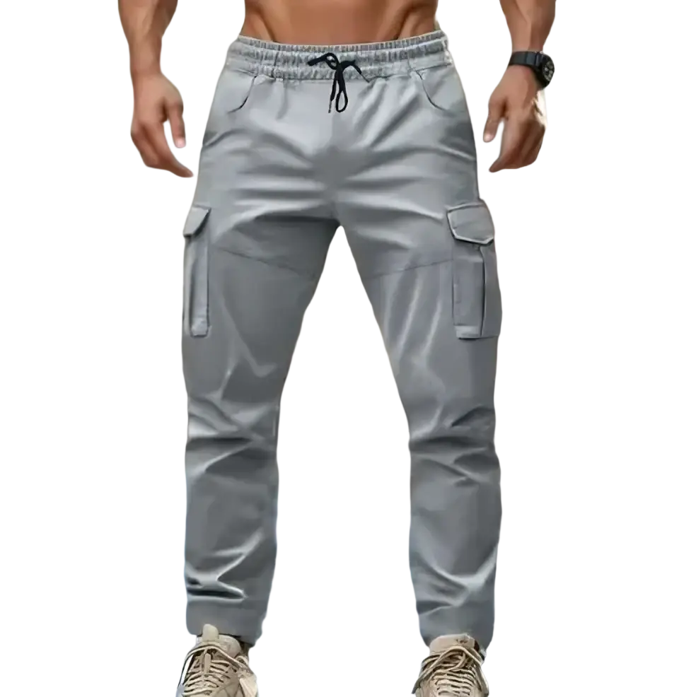 Men’s gray cargo pants with elastic waistband black drawstring multiple pockets and tapered leg casual joggers