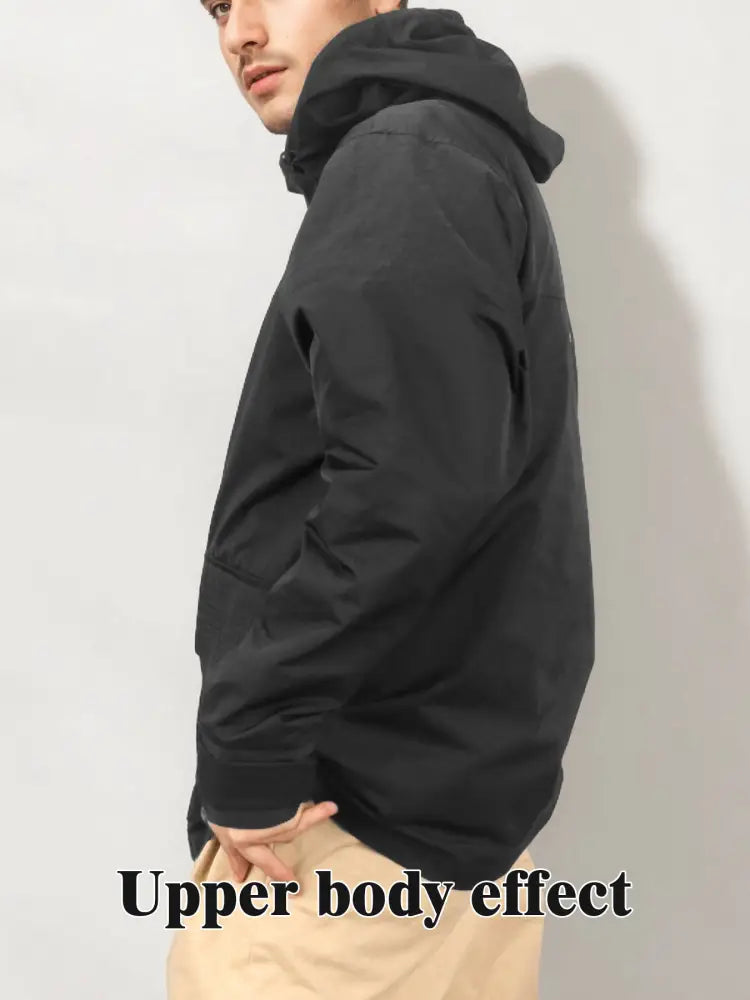 Black hooded men’s all weather tactical assault rainproof parka with sleek modern design and subtle stitching details