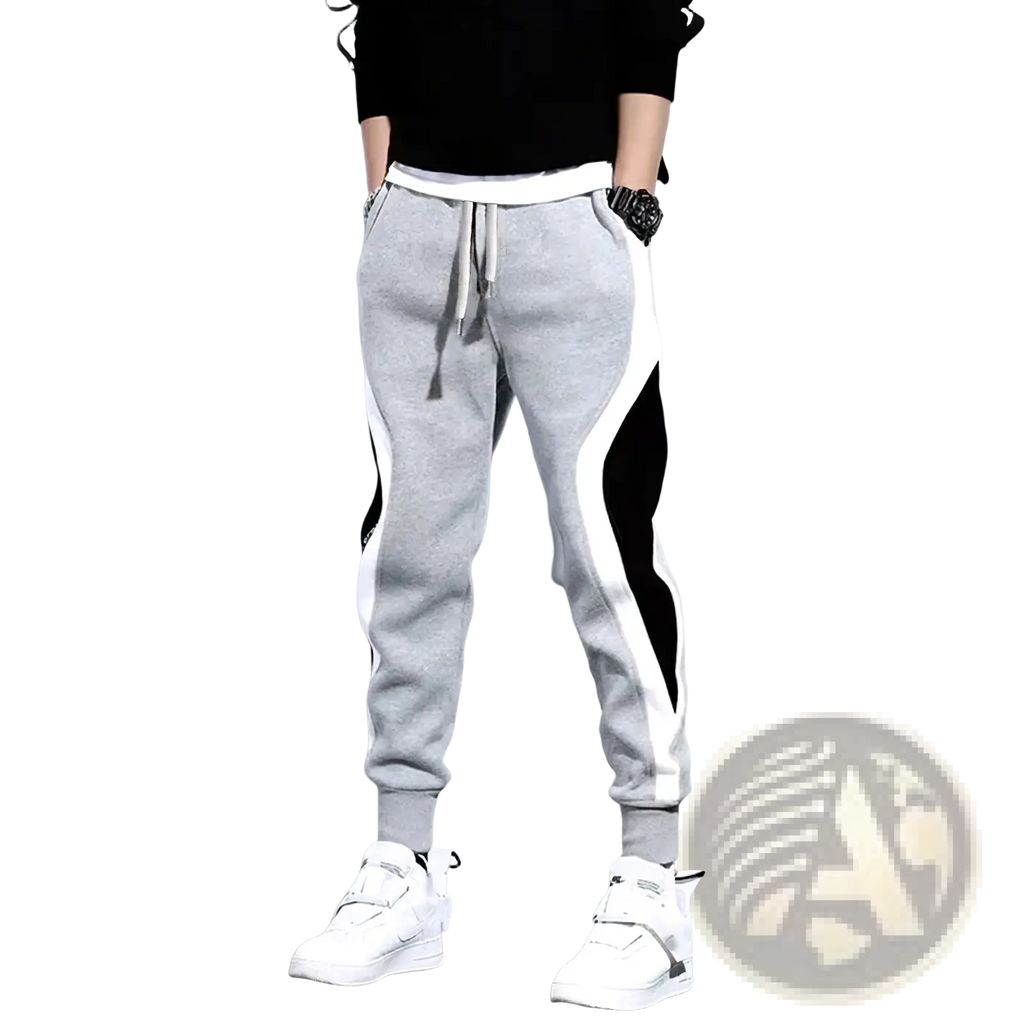 Men’s patchwork casual joggers in gray with black and white side panels, drawstring waistband, and elastic cuffs